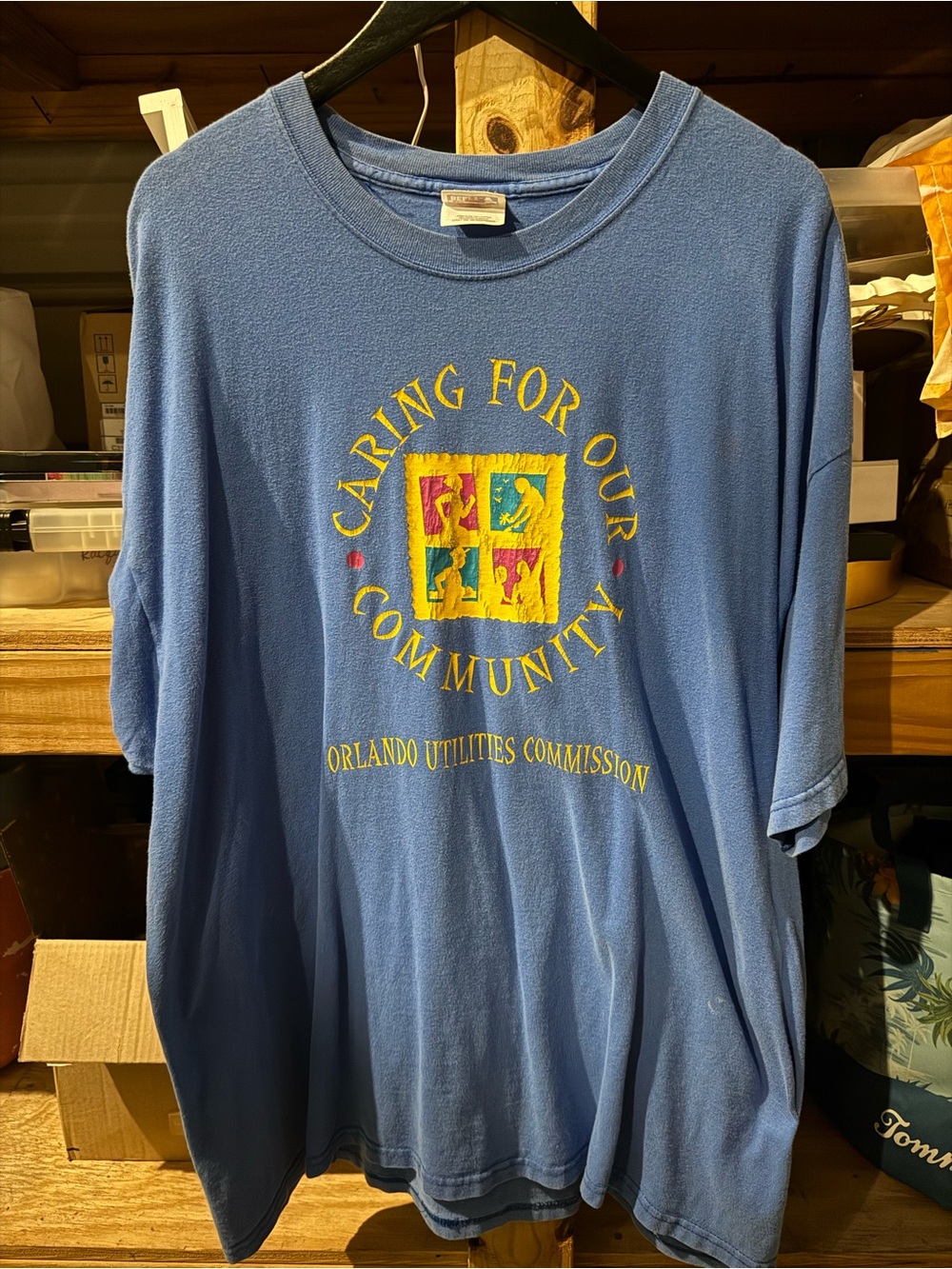 Caring For Our Community Orlando Utilities Commission Blue Tee 2XL